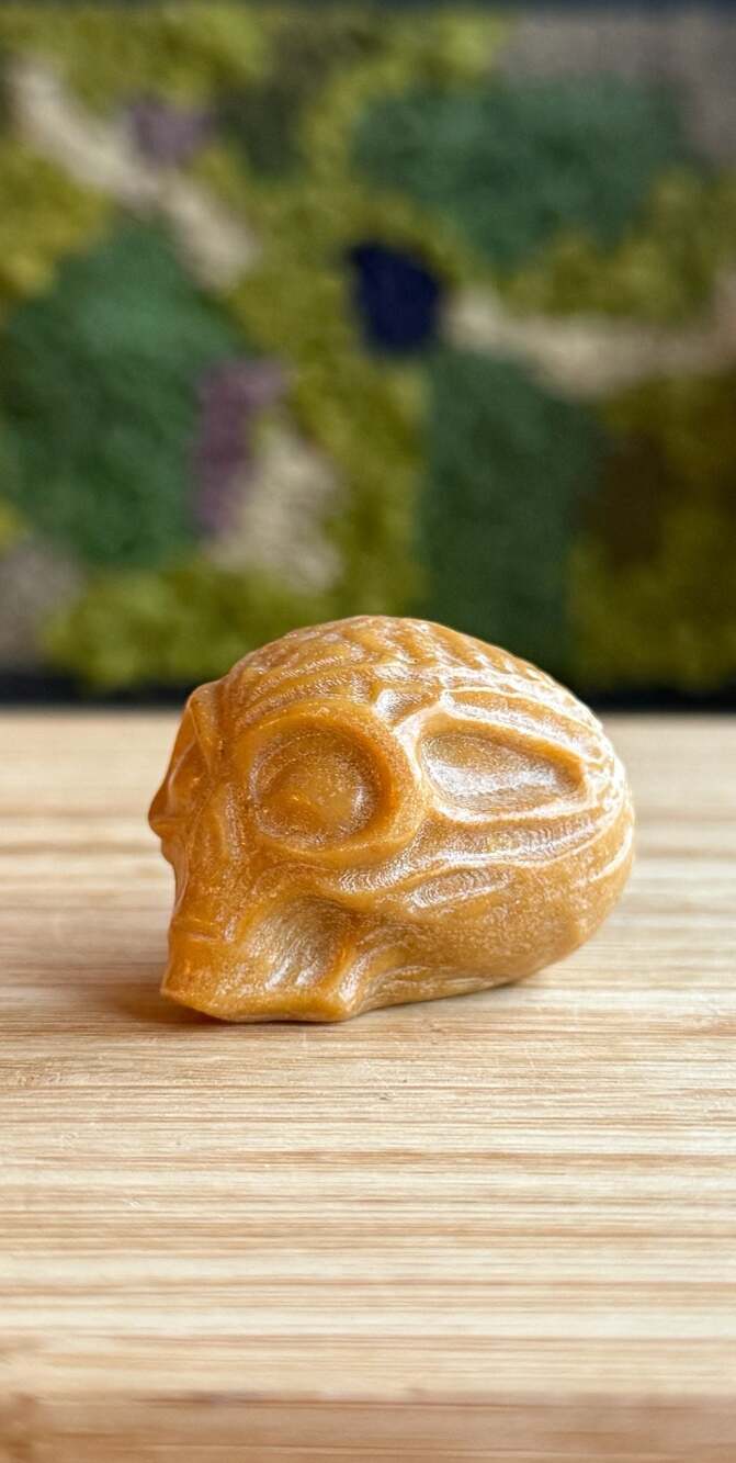 Hand Carved Yellow Calcite Crystal Alien Skull Figurine